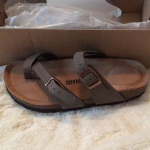 Brown sandals. New in box. Size 6 M
